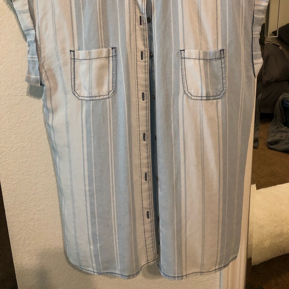 Oversized light blue striped blouse with collar